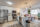 A kitchen with white cabinets