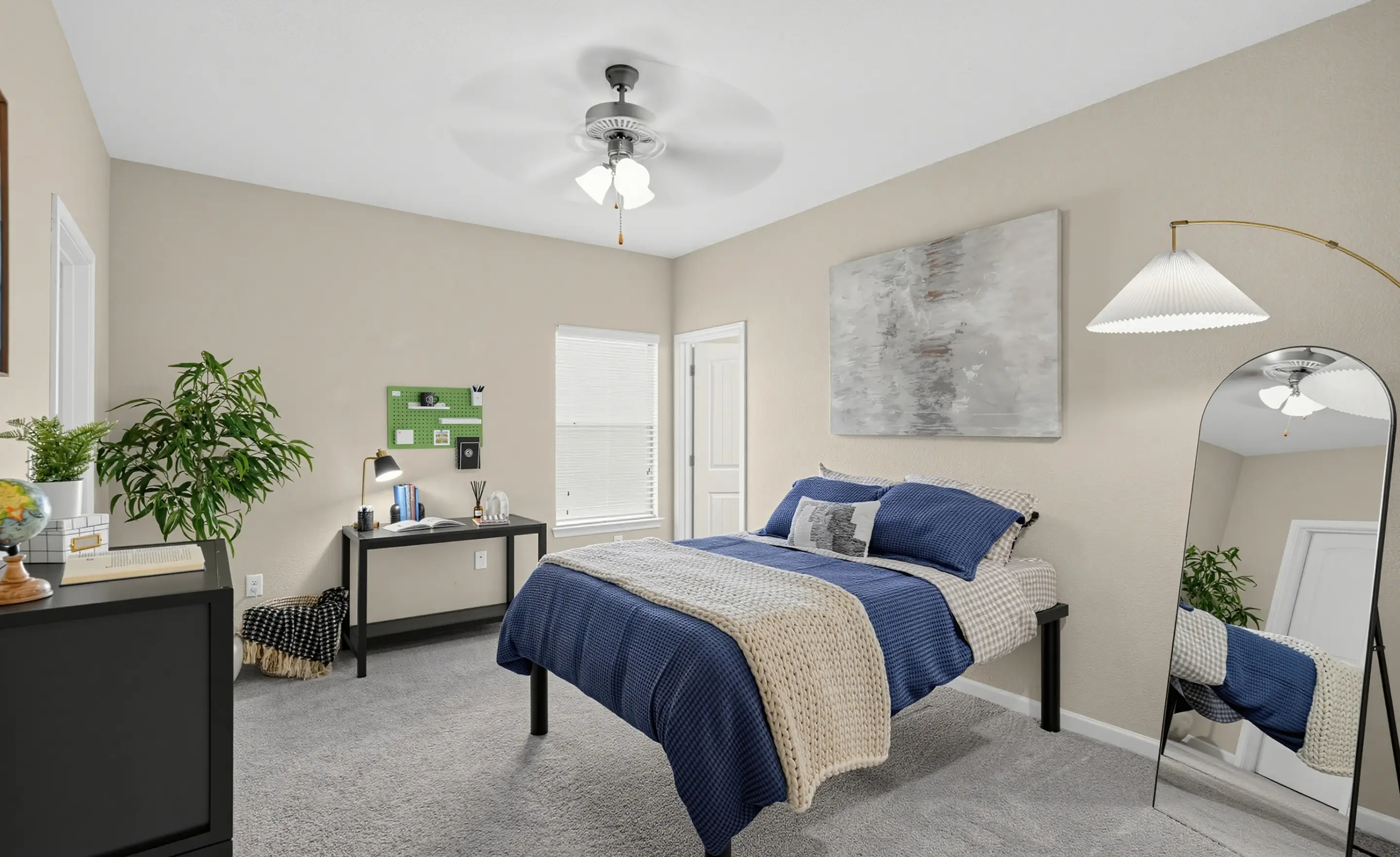furnished bedroom with bed and dresser