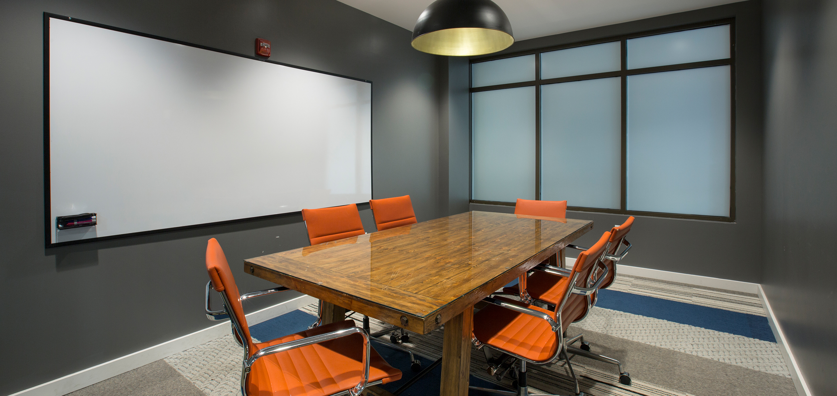 A study room with a whiteboard