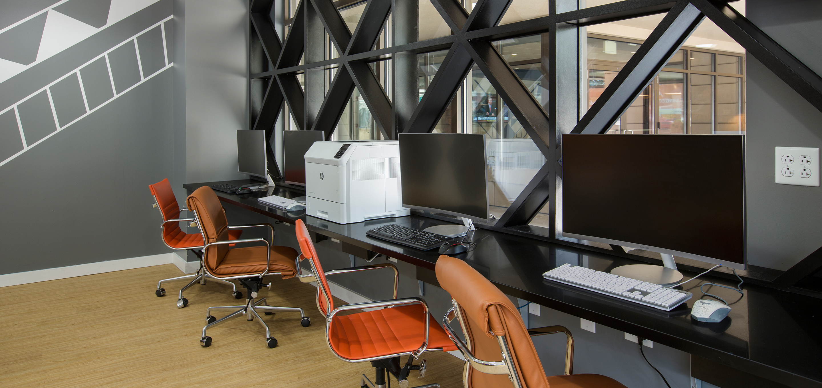 A computer room with a printer