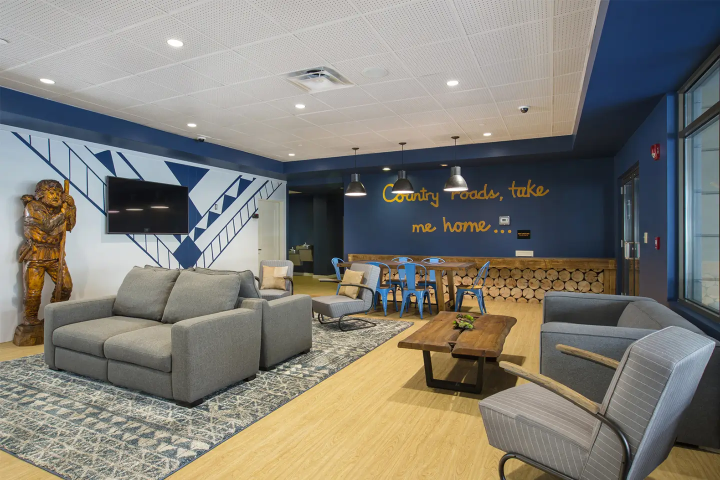 Couches and tables in study spaces at State on Campus Morgantown