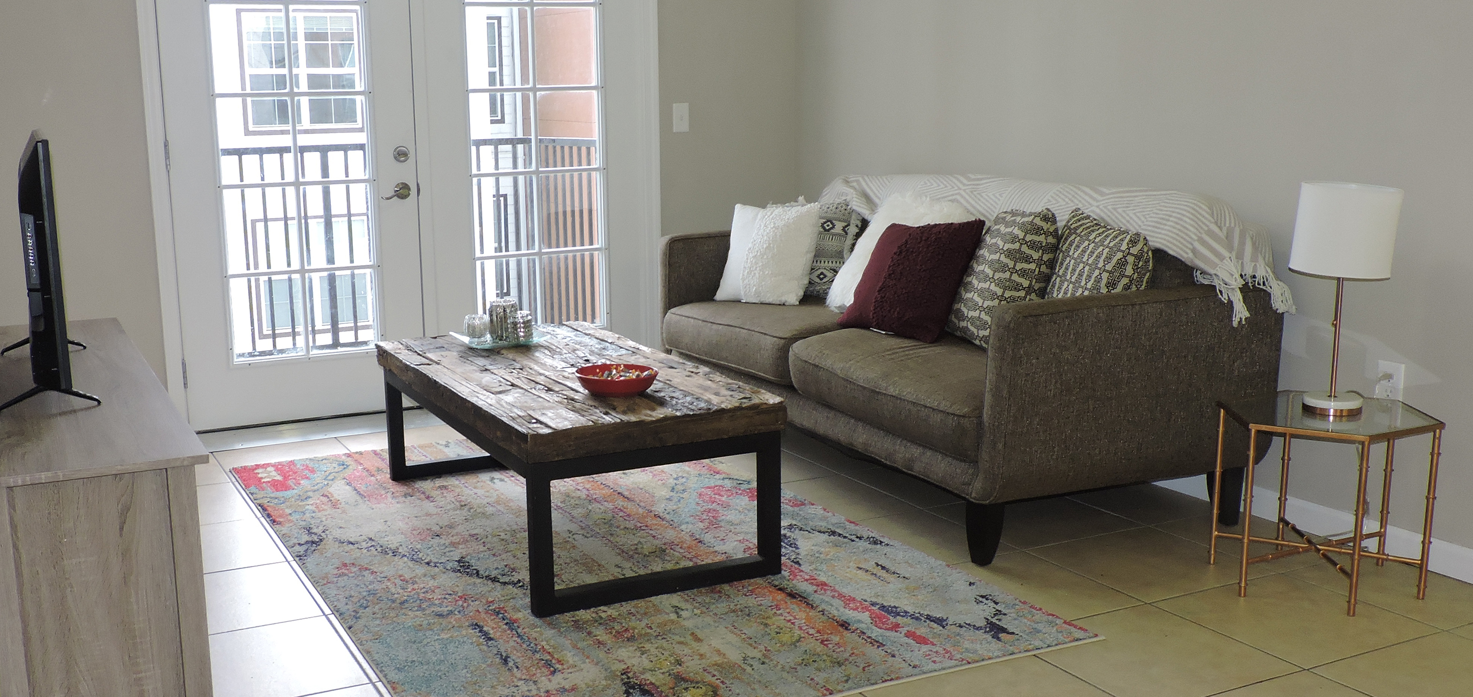 A living room with a TV